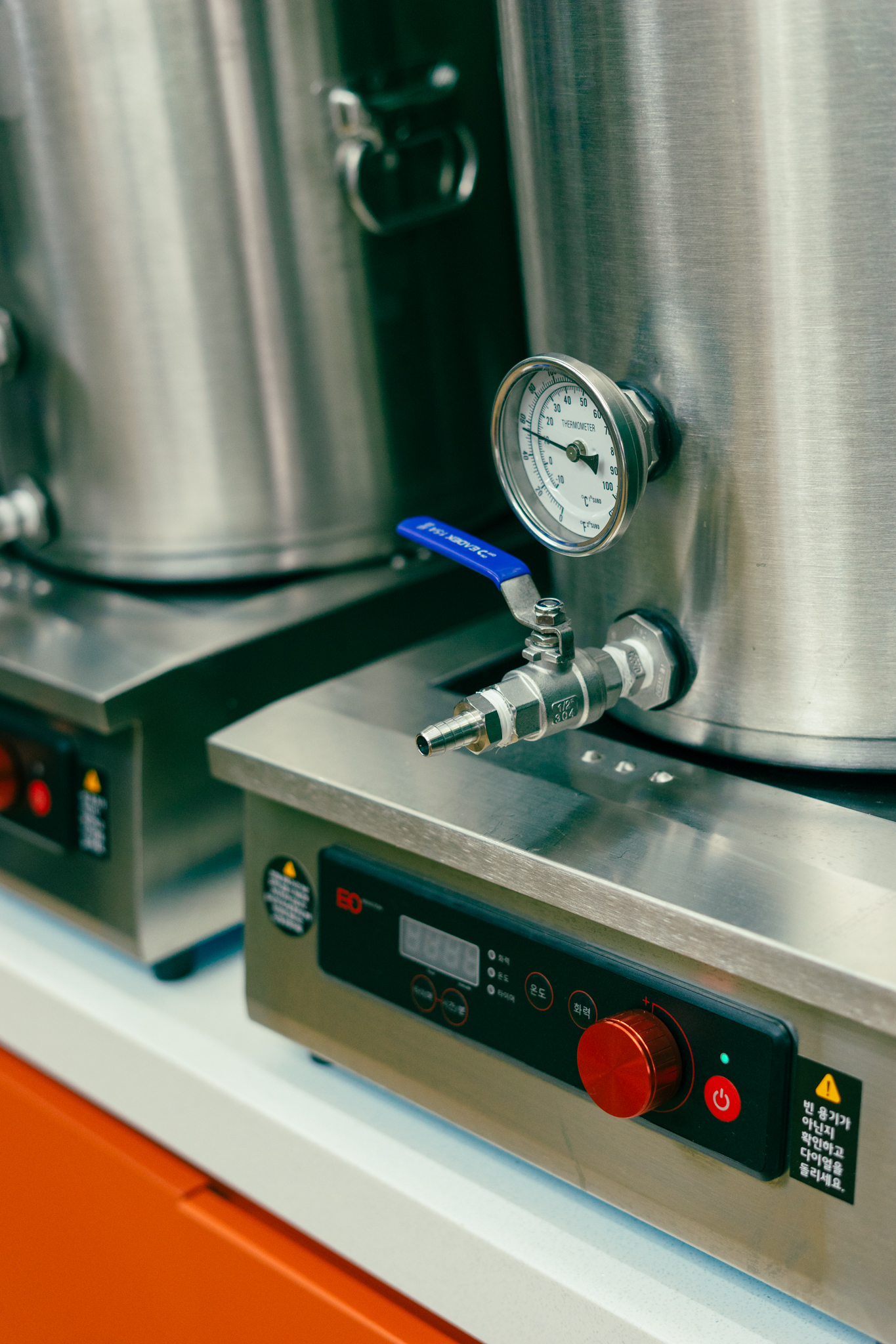 Brewing equipment detail with pressure gauge