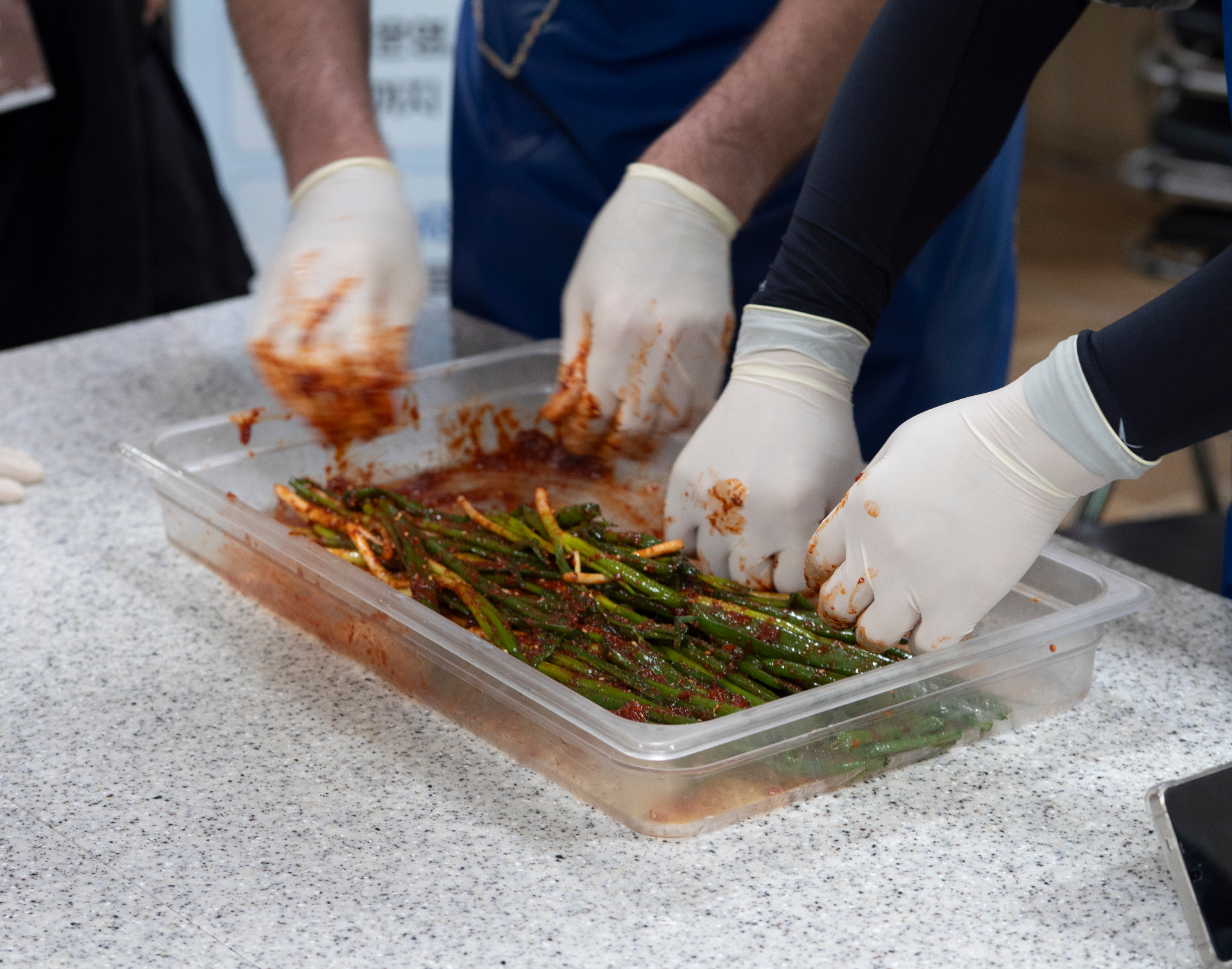 Hands-on kimchi preparation workshop showcasing traditional Korean fermentation techniques
